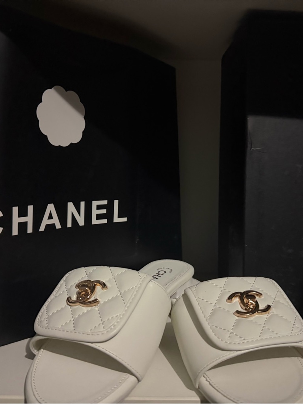 CHANEL White Quilted Leather Slide Mules with Gold CC Emblem